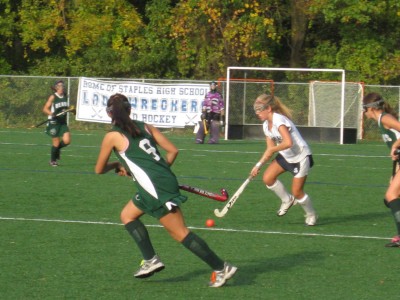 Sammie Hardy '11 brings the ball up the field. | Photo by Emily Kowal