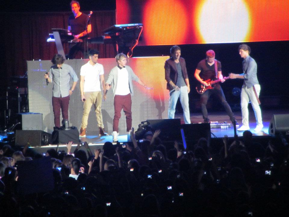 One Direction sings on stage at their concert on May 25th at the Izod Center