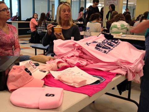 Assortment of pink logowear for footballs upcoming Play For The Cure game.