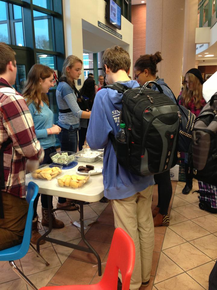 Staples students flock towards the bake sale table when the bell rings at 2:15
