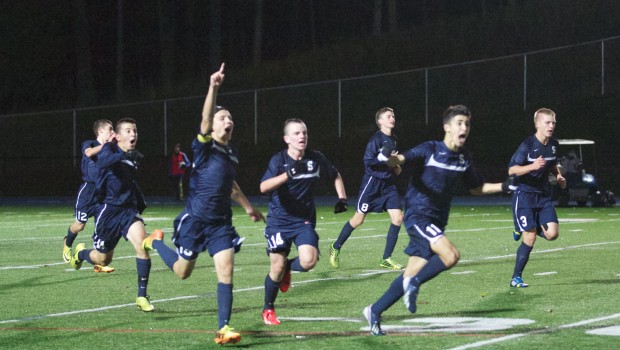 Jack Scott 14 raises his arm in celebration of what proved to be the winning goal in Stapless win over Newtown in the second round of states. 