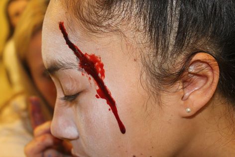 Senior, Terena Koteka-Wiki, a victim, has ‘blood’ dripping down her face after her ‘death.’ 

