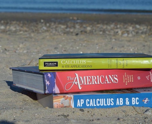 Textbooks trump tan lines