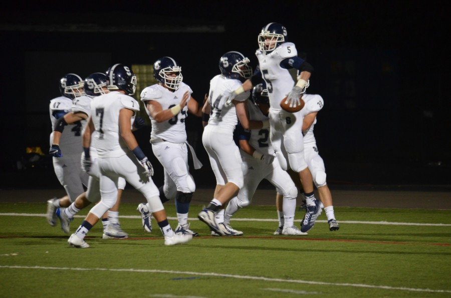 Nick Esposito ’15 (#5), celebrates his fumble-recovery-touchdown, accomplishing a defensive goal of the Wreckers
