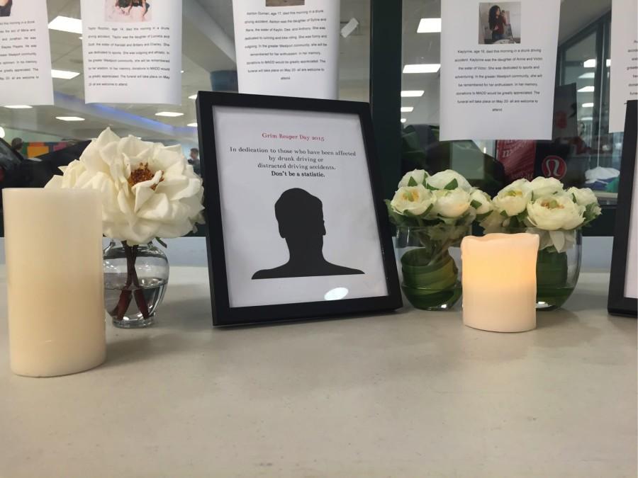 Candles and flower memorials stand outside the Staples Cafeteria to respect and remember those killed and impacted by accidents of drunk driving. 