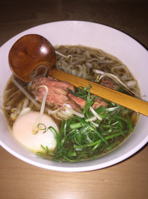 The Smoked Rare Brisket Pho featured in the noodles section of the menu.