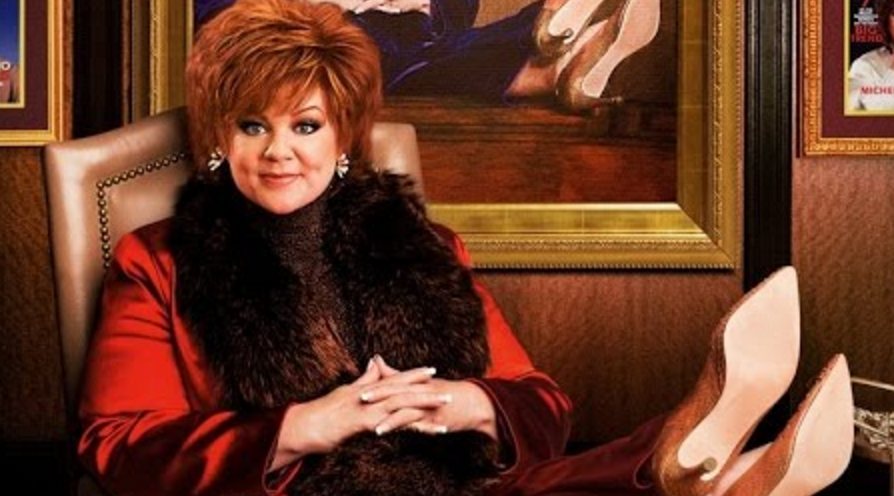 Melissa McCarthy played Michelle Darnell, a wealthy CEO recently released from federal prison due to insider trading.  