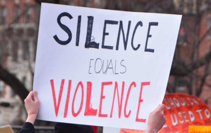 Faculty and students wear orange to protest gun violence
