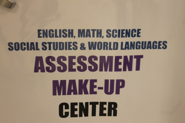 
Photo of sign outside of the Assessment Center. It is located on the door of the make-up center.


