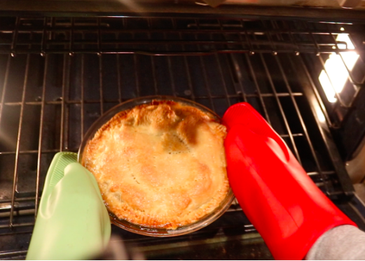 After 50 minutes of baking at 375 degrees Fahrenheit, the apple pie is ready to be taken out of the oven. The pie’s delicious smells make everyone eager to eat it.