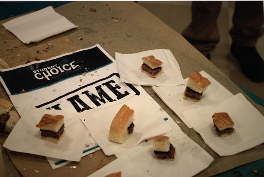 Students were able to vote towards chicken sliders or hamburgers through taste testing outside the Cafeteria. 