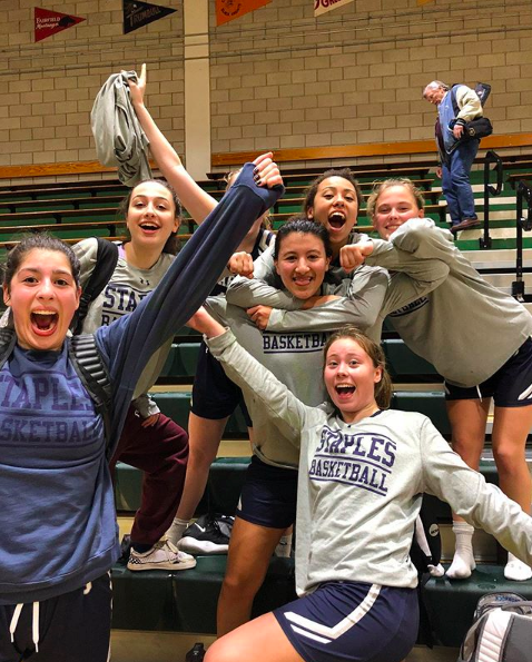 The Staples girls’ basketball team celebrated their win against Norwalk High School during the FCIAC tournament. Their season has been cut short due to the cancelation of the CIAC tournament.