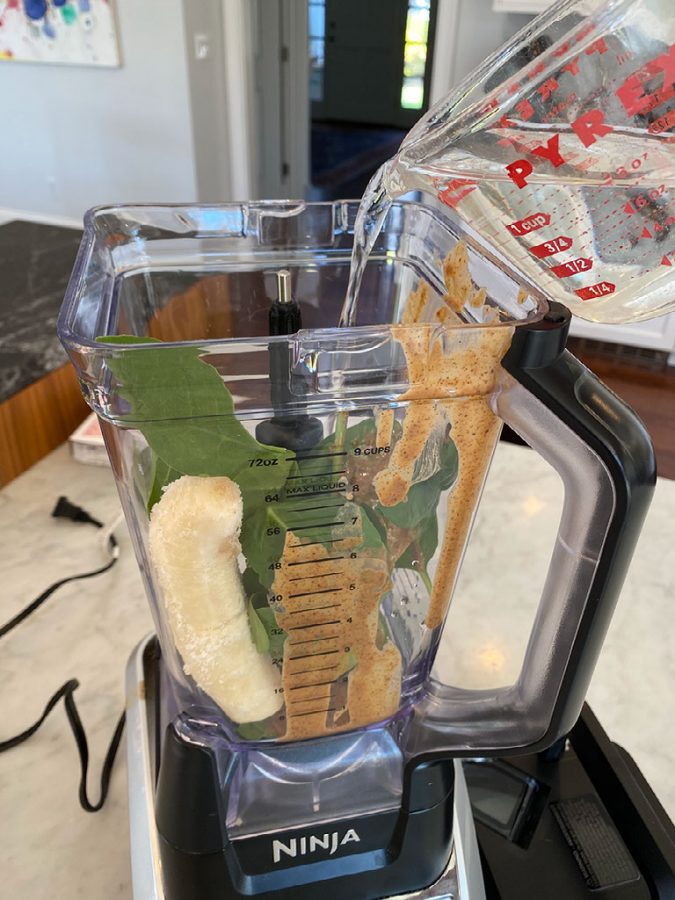 Combine+frozen+bananas%2C+spinach%2C+almond+butter%2C+protein+powder+and+a+cup+of+water+to+make+the+perfect+summer+refresher.