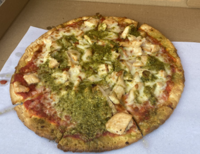 Tutti’s chicken pesto gluten-free pizza offers a unique flaky crust for those with Celiac Disease.