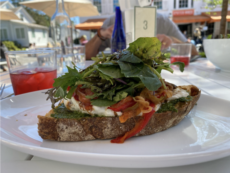 Manna Toast’s menu features sourdough toasts topped with a variety of different ingredients. The cafe also serves soups, salads, baked goods and more. 