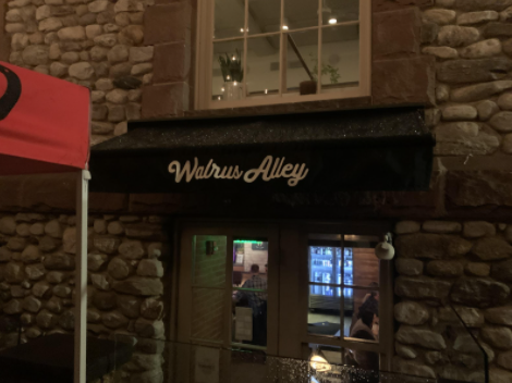 To start your night, you have to walk through the hidden entrance of Walrus Alley. 