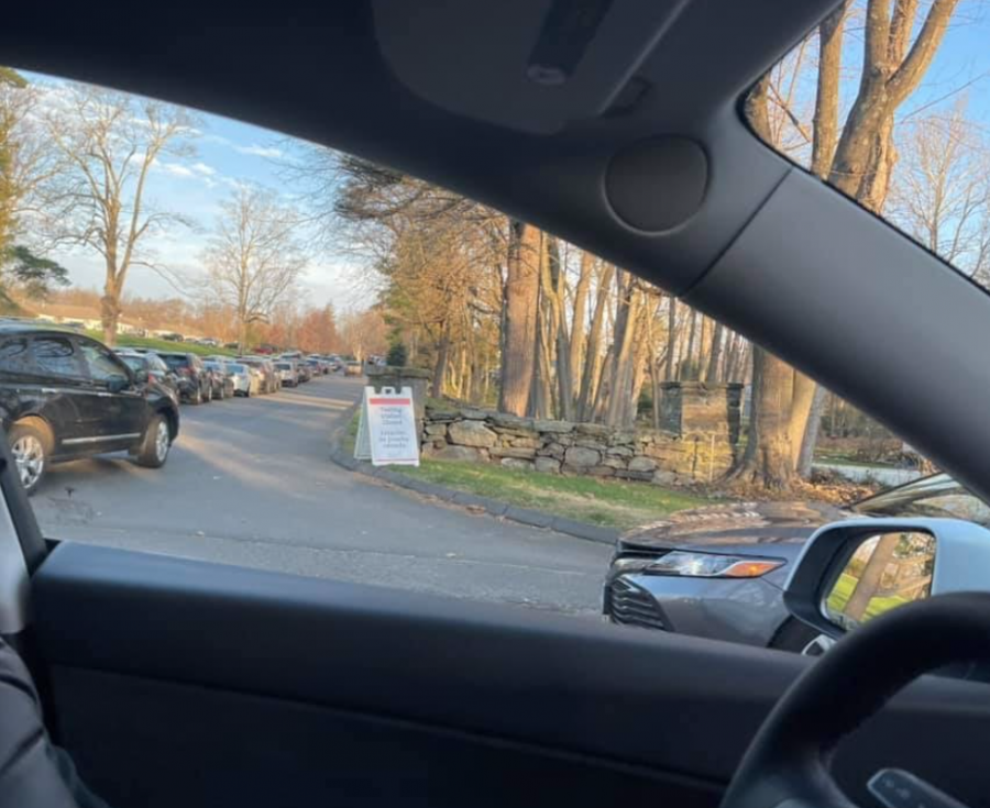 A+long+line+of+cars+waiting+for+COVID-19+testing+at+St.+Vincents+in+Westport.+Staples+is+still+continuing+with+hybrid+learning+despite+the+rising+numbers+of+Covid+cases+in+Connecticut+after+the+holiday+break.+