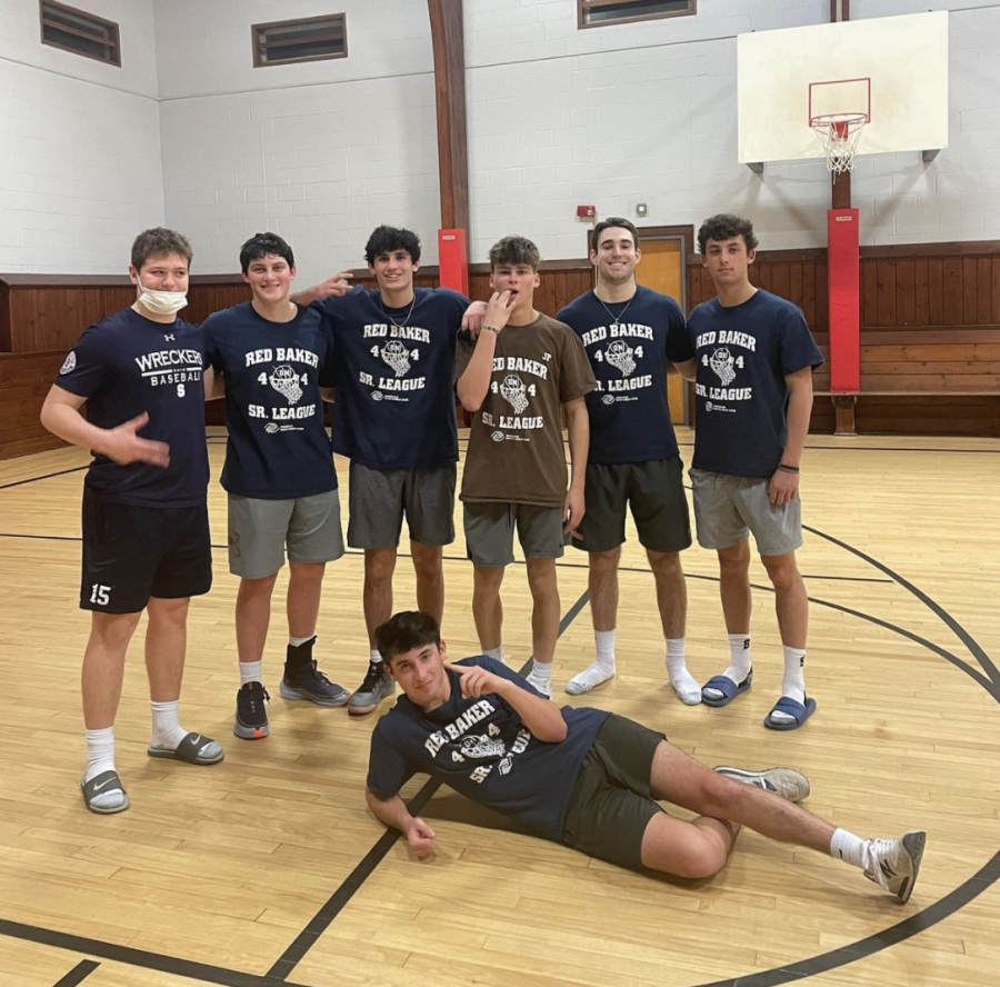 A team of senior boys pose after a win during the end of the rec basketball season.