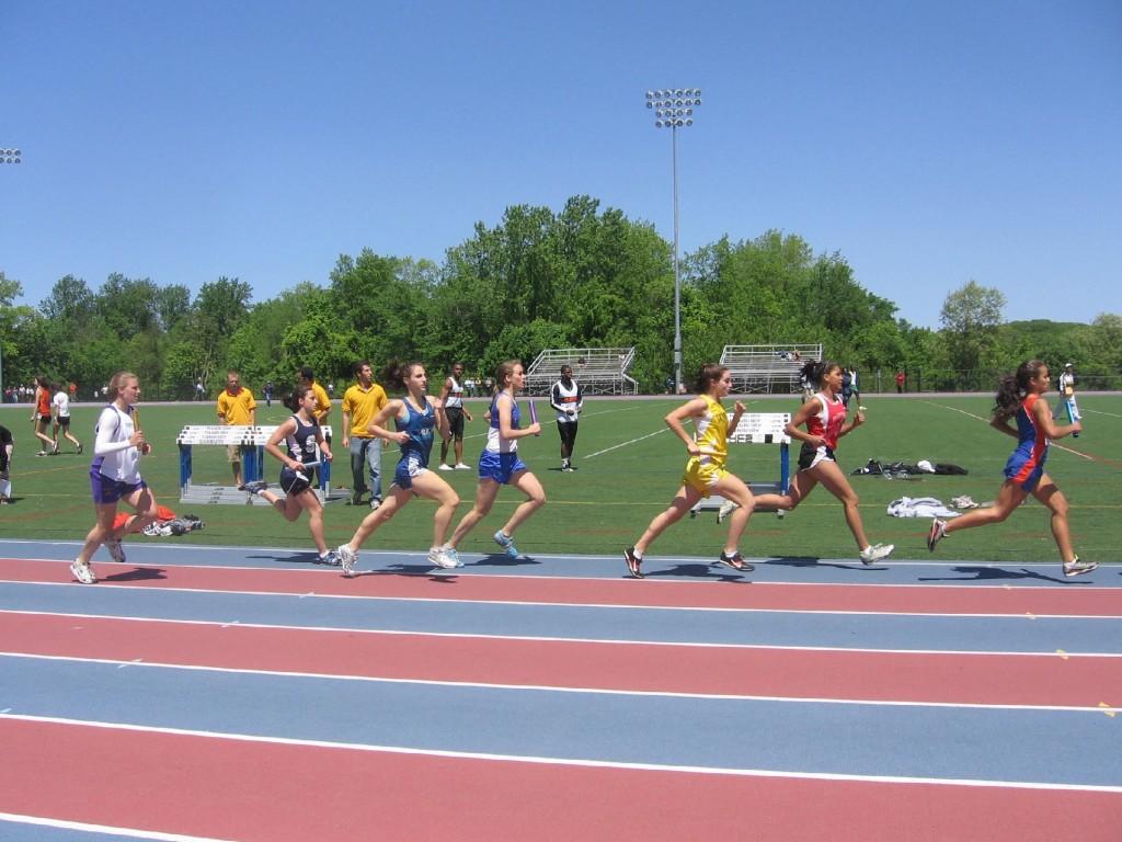 Photo by Olivia Allen 10 | Nicole Lepre 09 (second from the left) running in the 4 x 800.