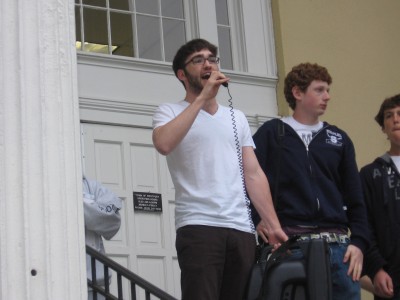 Mikey McGovern '09 addresses the crowd of students. "We know that education doesn’t simply happen in the classroom," said McGovern in his speech. Photo by Lila Epstein '10