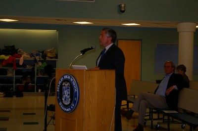 Mike McGovern presents the Community Conversation to the Board members | Photo by Natasha Gabbay