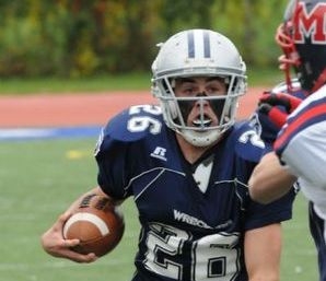 Matt Kelly 10 leads the Wreckers to Victory with three TDs. Photo courtesy of Staplesfootball.com (Dan Gelman)