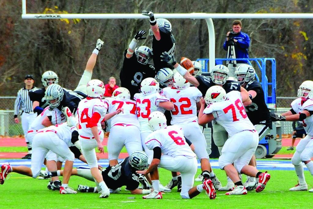 GAME OVER: Rob Gau 11, Jack Ambrose 10, and Quad-Captain Devin Graber 10 blocked what would have been a game-winning field goal for the Greenwich Cardinals as time expeired in the Nov. 26 game. | Photo Contributed by Daniel Gelman