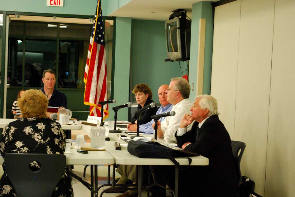 Elliot Landon and other board members listen during a recent BOE meeting. |Eric Essagof 12