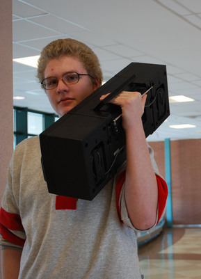 Hip Hop Hot Spot: Jamie Morgan 11 blasts beats from his vintage boombox through the second floor hallways on his way to class. | Photo by Madeline Hardy 
