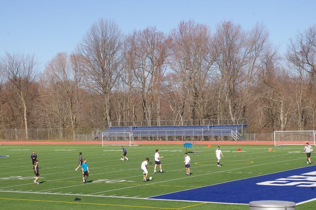 The rugby team practices for their upcoming games. | Photo by Alicia Lourekas 12