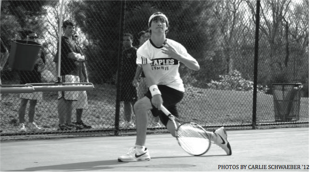 SERVE AND VOLLEY: Danny Hirschberg 11 hits a running forehand during his match. 