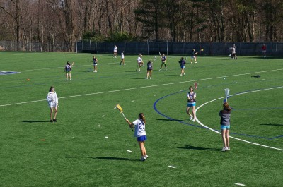 With so many girls interested in playing lacrosse this year, 77 to be exact, Coach Schager was forced to make cuts for the first time ever. | Photo by Carlie Schwaeber '12