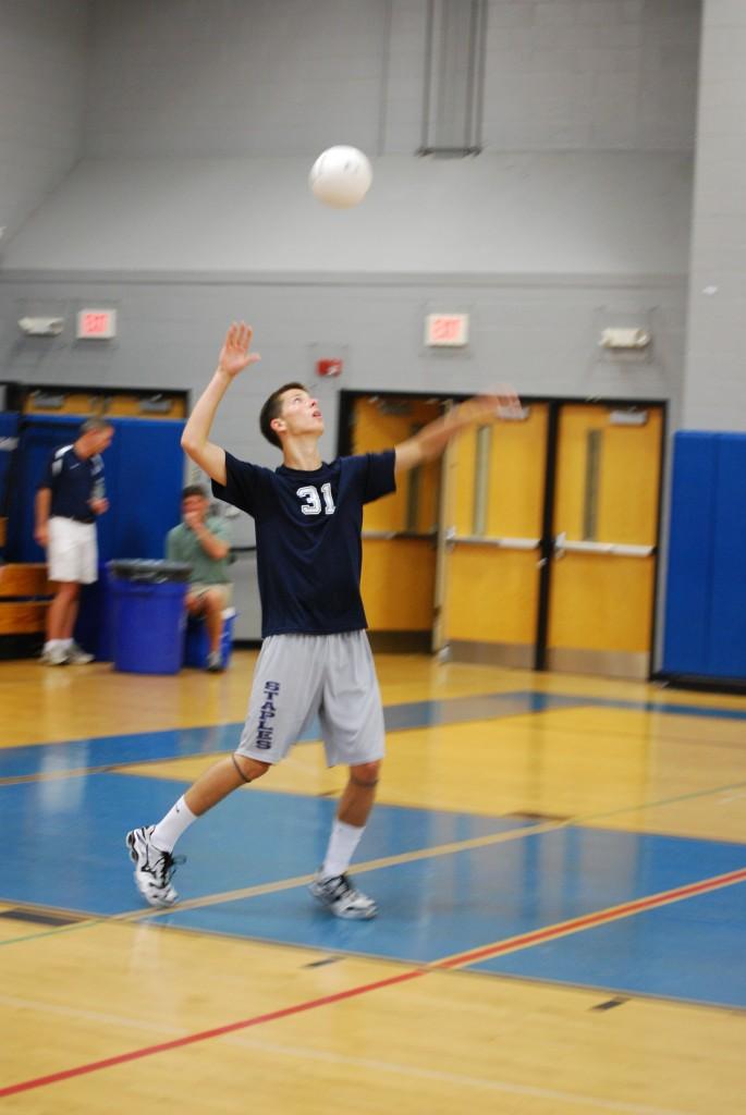 Quint-captain Evan Gaumert 10 gets ready to serve the ball in the first game against the Greenwich Cardinals. The Wreckers will look to win their 8th FCIAC championship Friday night against the Darien Blue Wave. |Photo by Madeline Hardy 11