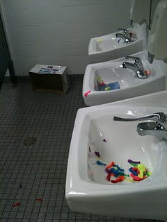 The remains of the senior water balloon fight lie in the sink. 