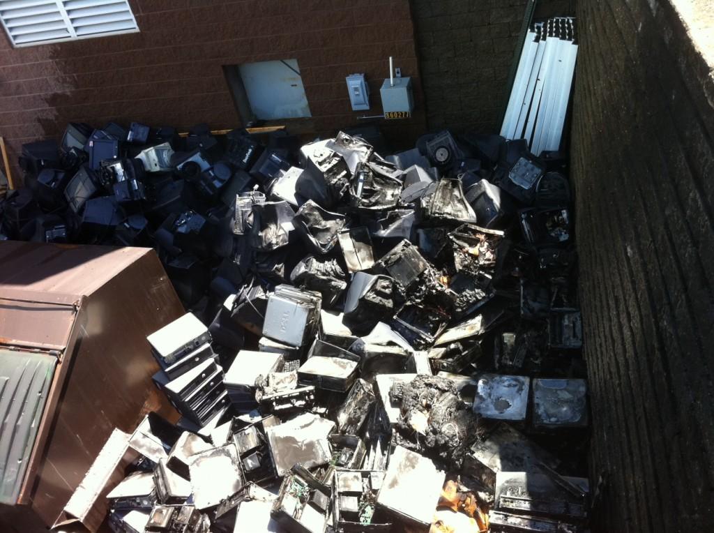 The heat of the fire partially melted the pile of abandoned computers outside of Bedford Middle School | Photo Mark Schwabacher 13