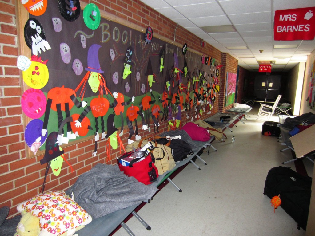 Cots are seen at the emergency shelter that has been set up at Long Lots Elementary School.