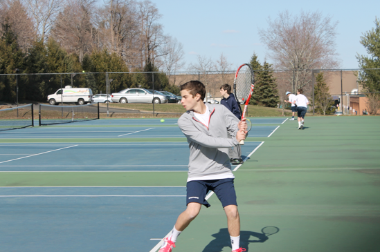 Max Berger ’15 gets ready to hit a backhand during the match 