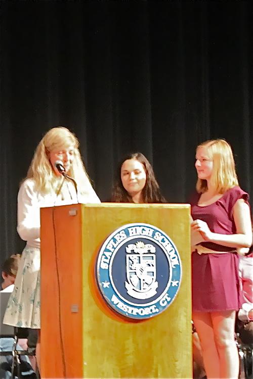 Child Development teacher Linda McClary recognizes Brynn Werner 13 and Allie Daut 13 for excellence.