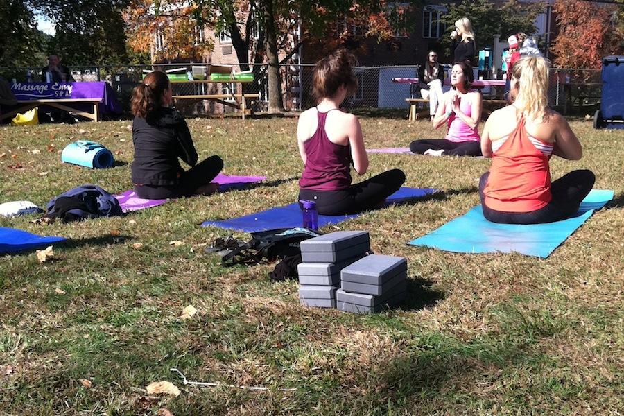 Westporters meditate at the conclusion of a yoga lesson on Veterans Green.