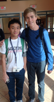 Kenny Brill ‘17 walks in the halls with Wan Jie