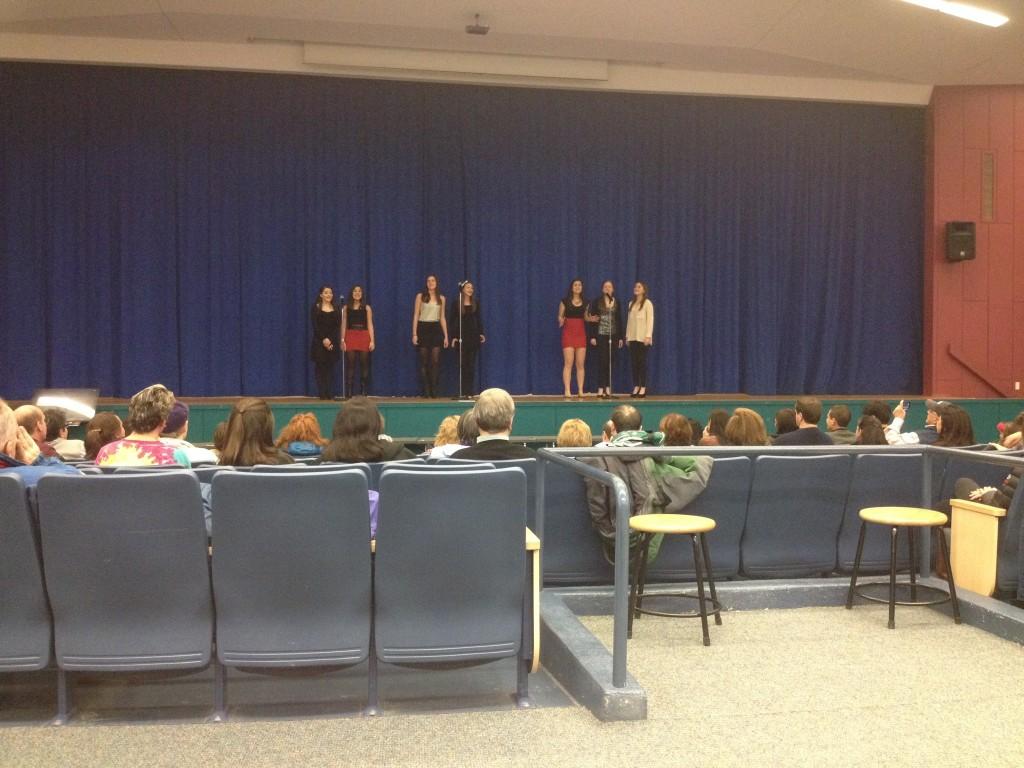 The girls of the group perform the song Shes In Love from the musical The Little Mermaid. 