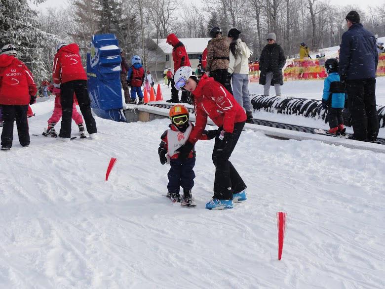 Emily Duranko guides and glides 4-year-old Remy for the Little Cub program at Stratton Mountain on Jan. 19. 
