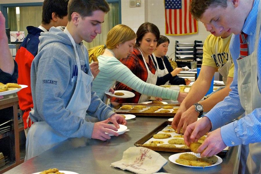 Culinary students bake cookies during class, just as Gans' Connections group does.