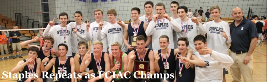Staples poses for a victory photo after repeating as FCIAC champions