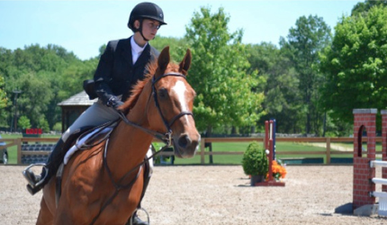 Megan Hagarty, who attends a private school in Stamford, rides in a competition at the Hunt Club on June 1, 2014