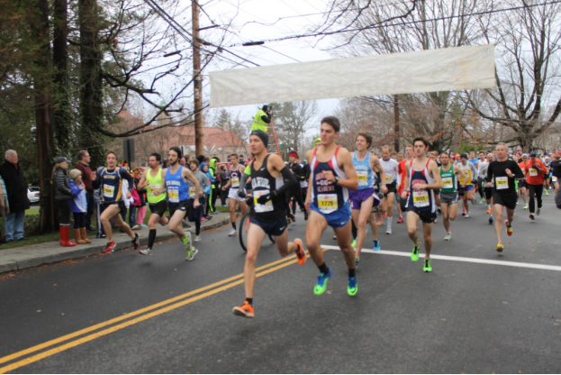 At 8:15 AM the race was on. Once the gun was shot, these runners sprung into action and led the race until the finish. 
