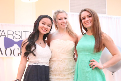 Olivia Consoli, Haley Burns, and Jesy Nelson ’16 dress in bright colored dresses prior to their moment of fame on the catwalk.