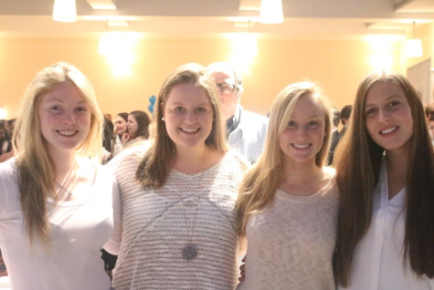 Maggie Walsh, Maggie Fair, Danielle Williams and Amelia Heisler ’15 show support for their friends in the show. 