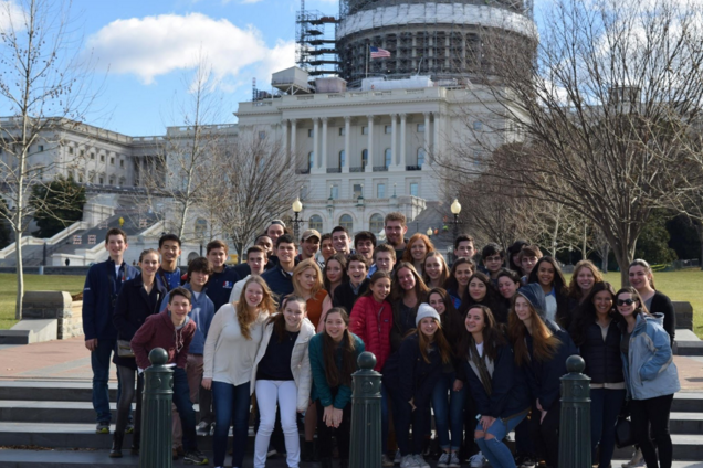 The Staples Chapter of JSA poses in front of the Capitol Building when sightseeing on Friday, Feb. 26
