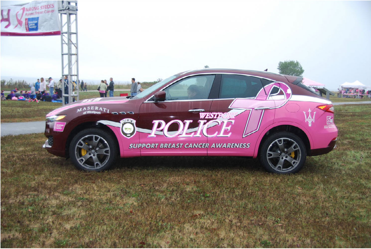 Pink police car spreads awareness while zipping around Westport